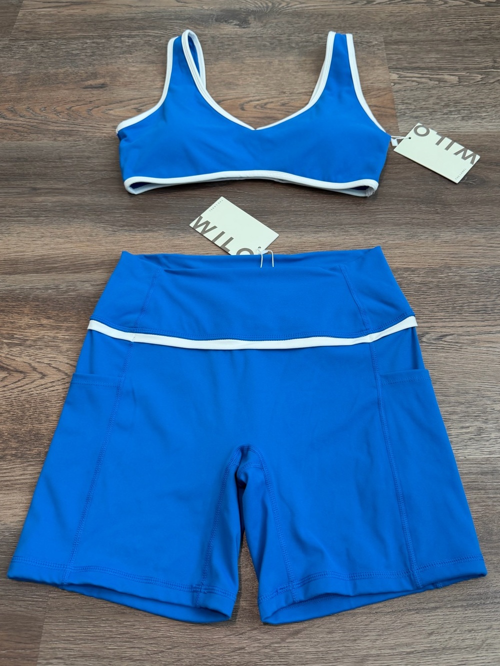 NWT Wilo The Label Active Set
Sports Bra Biker Shorts Cobalt Blue
White Medium